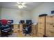 Office with hardwood floors, ceiling fan and two desks at 281 Laney Dr, Locust Grove, GA 30248