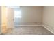 A spacious basement with neutral carpet and ample natural light at 5845 Highway 92, Fairburn, GA 30213