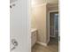 A contemporary bathroom featuring a white shower and a white vanity at 5845 Highway 92, Fairburn, GA 30213