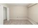 Bright bedroom with closet has neutral walls and plush carpeting at 5845 Highway 92, Fairburn, GA 30213