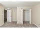 Light-filled bedroom features neutral walls and carpeting at 5845 Highway 92, Fairburn, GA 30213