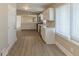 Kitchen features stainless steel appliances, white cabinets and laminate countertops at 5845 Highway 92, Fairburn, GA 30213