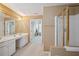 This bathroom has a double sink, soaking tub, and shower at 6844 Cavalier Ct, Stone Mountain, GA 30087