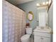 Cozy bathroom with vanity and patterned shower curtain at 6844 Cavalier Ct, Stone Mountain, GA 30087