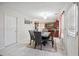 Dining room featuring a stone table and a view into the kitchen at 6844 Cavalier Ct, Stone Mountain, GA 30087