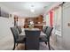 Dining room featuring a stone table and a view into the kitchen at 6844 Cavalier Ct, Stone Mountain, GA 30087