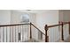 Foyer features a staircase with white railings and a large arched window at 6844 Cavalier Ct, Stone Mountain, GA 30087