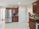 A spacious kitchen featuring granite countertops and stainless steel appliances at 6844 Cavalier Ct, Stone Mountain, GA 30087
