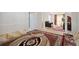 Spacious living room with unique floor seating arrangement, flowing into a traditionally furnished room at 6844 Cavalier Ct, Stone Mountain, GA 30087