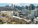 Elevated view of a condo building near the downtown skyline and urban neighborhood at 1116 Piedmont Ne Ave # 12, Atlanta, GA 30309
