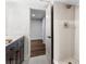 Bright bathroom featuring tile shower with a glass door, and dark wood vanity at 1116 Piedmont Ne Ave # 12, Atlanta, GA 30309