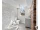 Bathroom with a brick accent wall and walk-in shower at 1116 Piedmont Ne Ave # 12, Atlanta, GA 30309