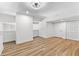 Bright bedroom with wood floors, white walls, and a built-in storage area at 1116 Piedmont Ne Ave # 12, Atlanta, GA 30309
