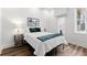 Serene bedroom with hardwood floors and natural light, offering a relaxing retreat at 1116 Piedmont Ne Ave # 12, Atlanta, GA 30309