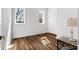 Bedroom with wood-look floors, side table, and closet at 1116 Piedmont Ne Ave # 12, Atlanta, GA 30309