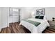 Bright bedroom with closet, wood-look flooring, and contemporary style at 1116 Piedmont Ne Ave # 12, Atlanta, GA 30309