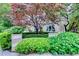 Beautifully landscaped garden featuring vibrant trees and manicured hedges surrounding a classic building at 1116 Piedmont Ne Ave # 12, Atlanta, GA 30309