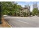 Charming building surrounded by lush greenery, blending urban living with natural beauty at 1116 Piedmont Ne Ave # 12, Atlanta, GA 30309