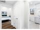 Hallway featuring bedroom, bathroom, and natural light from nearby window at 1116 Piedmont Ne Ave # 12, Atlanta, GA 30309