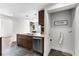 Modern kitchen with stainless appliances near the laundry area at 1116 Piedmont Ne Ave # 12, Atlanta, GA 30309