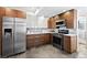 Modern kitchen featuring stainless steel appliances, stylish cabinets, and tile backsplash at 1116 Piedmont Ne Ave # 12, Atlanta, GA 30309