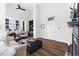 Spacious living room with hardwood floors, fireplace, and large windows offering great natural light at 1116 Piedmont Ne Ave # 12, Atlanta, GA 30309
