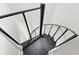 Spiral staircase with black metal railing and diamond pattern stairs at 1116 Piedmont Ne Ave # 12, Atlanta, GA 30309