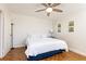 Bright bedroom with a ceiling fan and hardwood floors at 300 W Peachtree St # 8C, Atlanta, GA 30308
