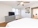 Serene bedroom with a dresser, closet, and ample natural light creating a relaxing space at 300 W Peachtree St # 8C, Atlanta, GA 30308