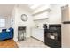 Compact kitchen with stainless steel appliances, granite countertops, and ample cabinet space at 300 W Peachtree St # 8C, Atlanta, GA 30308