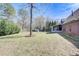 Large backyard with storage shed, screened porch, and ample green space at 477 Glouchester Dr, Locust Grove, GA 30248