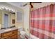 Full bathroom with shower/tub combo and wooden vanity at 477 Glouchester Dr, Locust Grove, GA 30248