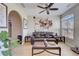 Inviting living room featuring comfortable seating, stylish decor, and natural light at 477 Glouchester Dr, Locust Grove, GA 30248