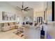 Large living room with high ceiling, neutral color palette, and comfortable seating at 477 Glouchester Dr, Locust Grove, GA 30248