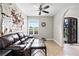 Comfortable living room with modern decor, ample natural light, and stylish furnishings at 477 Glouchester Dr, Locust Grove, GA 30248