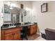 Bathroom features double sinks, granite counters, a soaking tub, and separate shower at 477 Glouchester Dr, Locust Grove, GA 30248