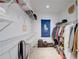 Walk-in closet with ample shelving and hanging storage space at 477 Glouchester Dr, Locust Grove, GA 30248