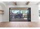 Back deck and view through open sliding doors at 1857 Defoor Ave, Atlanta, GA 30318