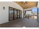 Outdoor deck featuring wooden ceilings, modern ceiling fan, and glass sliding doors at 1857 Defoor Ave, Atlanta, GA 30318