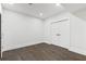 This bedroom offers recessed lighting and beautiful, dark, laminate flooring at 1857 Defoor Ave, Atlanta, GA 30318