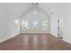 Spacious bedroom featuring high ceilings, hardwood floors, and plenty of natural light at 1857 Defoor Ave, Atlanta, GA 30318