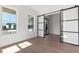 Light-filled room with large windows and sliding barn door at 1857 Defoor Ave, Atlanta, GA 30318