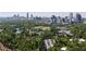 Stunning aerial view of a city skyline with a lush green park in the foreground at 581 Sherwood Ne Rd, Atlanta, GA 30324
