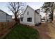 A home backyard featuring a wood fence and green grass at 581 Sherwood Ne Rd, Atlanta, GA 30324