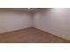 Finished basement area with hardwood flooring and clean neutral walls at 581 Sherwood Ne Rd, Atlanta, GA 30324