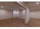 View of finished basement with recessed lighting and wood-look vinyl plank flooring at 581 Sherwood Ne Rd, Atlanta, GA 30324