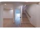 Basement featuring an open door frame offering a view of a staircase and main basement area at 581 Sherwood Ne Rd, Atlanta, GA 30324
