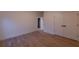 Bright bedroom with hardwood floors, closet, and neutral paint at 581 Sherwood Ne Rd, Atlanta, GA 30324
