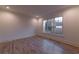 Spacious bedroom with hardwood floors and large windows at 581 Sherwood Ne Rd, Atlanta, GA 30324