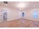 A bright, spacious bedroom featuring wooden floors, white trim, and custom closet at 581 Sherwood Ne Rd, Atlanta, GA 30324